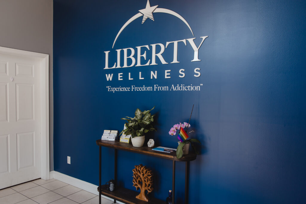 Addiction Counseling and Treatment Programs in Berlin, NJ. Image - Liberty Wellness (Interior) Hall / Office Logo
