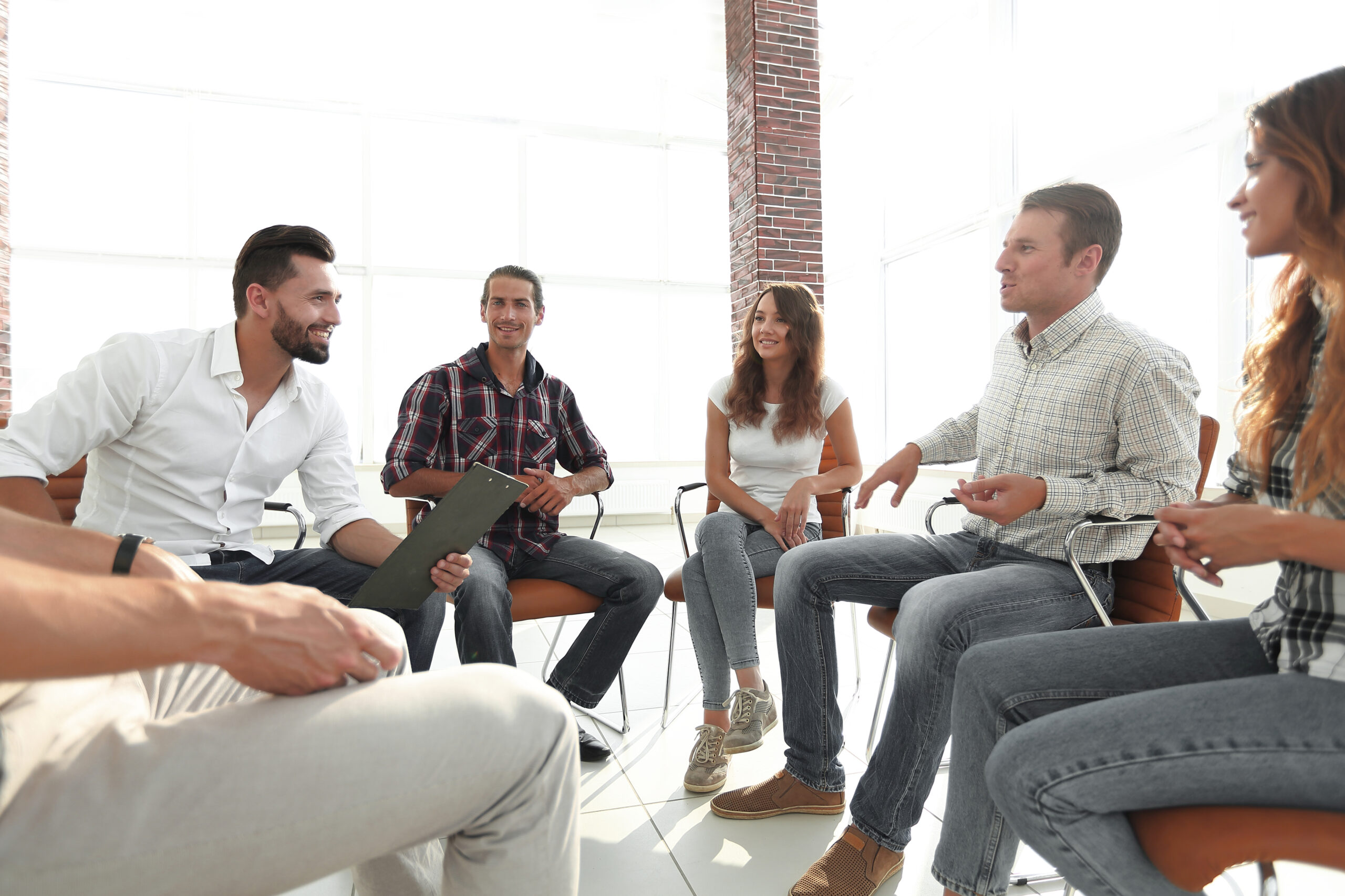Alcohol Counseling at Liberty Wellness. Image: Group of people in therapy.