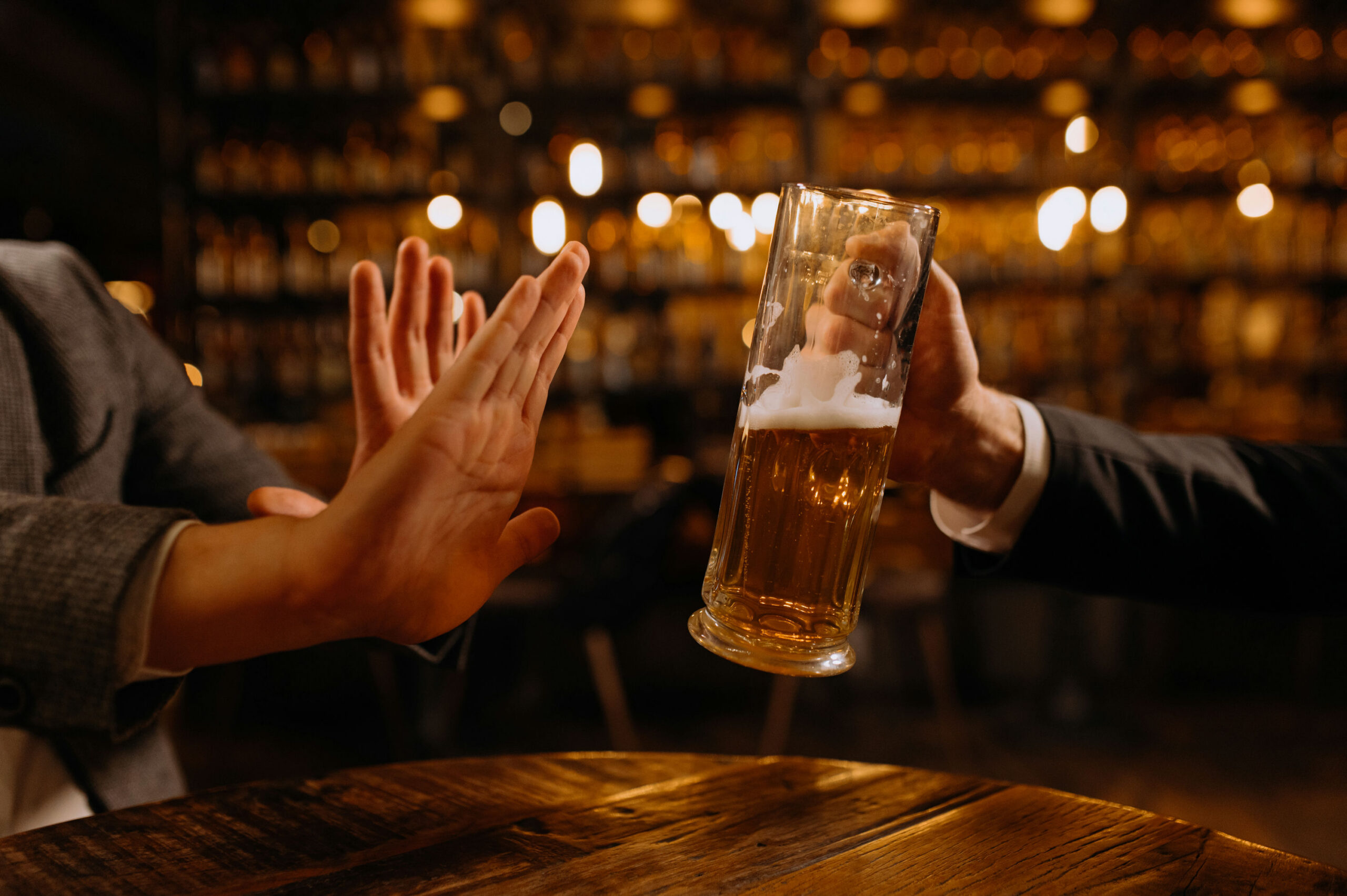 how alcoholism differs from binge drinking