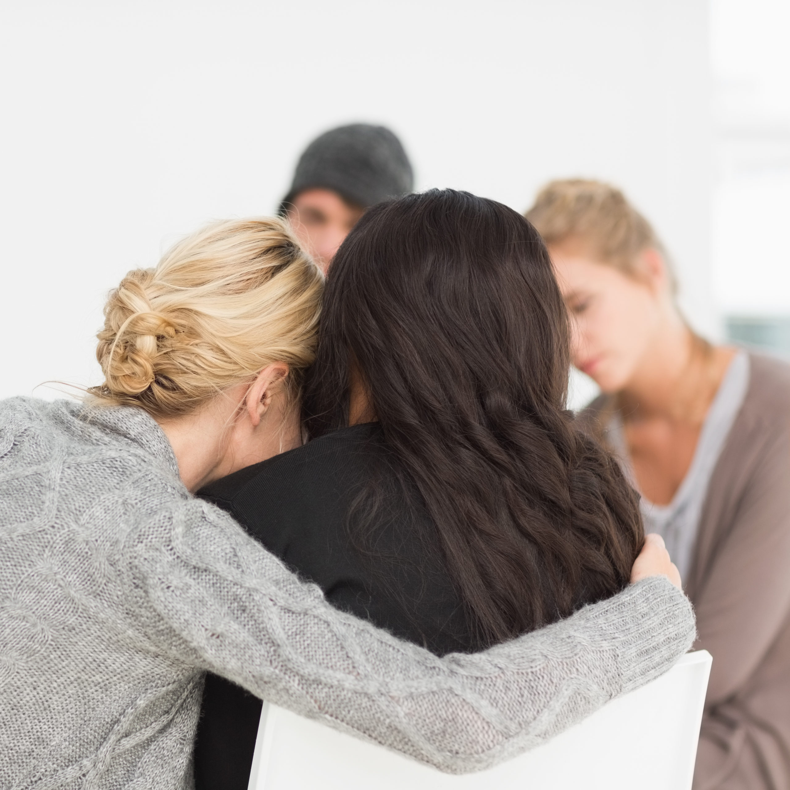 Participants in a group therapy session for PTSD treatment in New Jersey