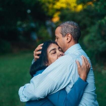 husband and wife embrace during family therapy for substance abuse in Berlin, NJ